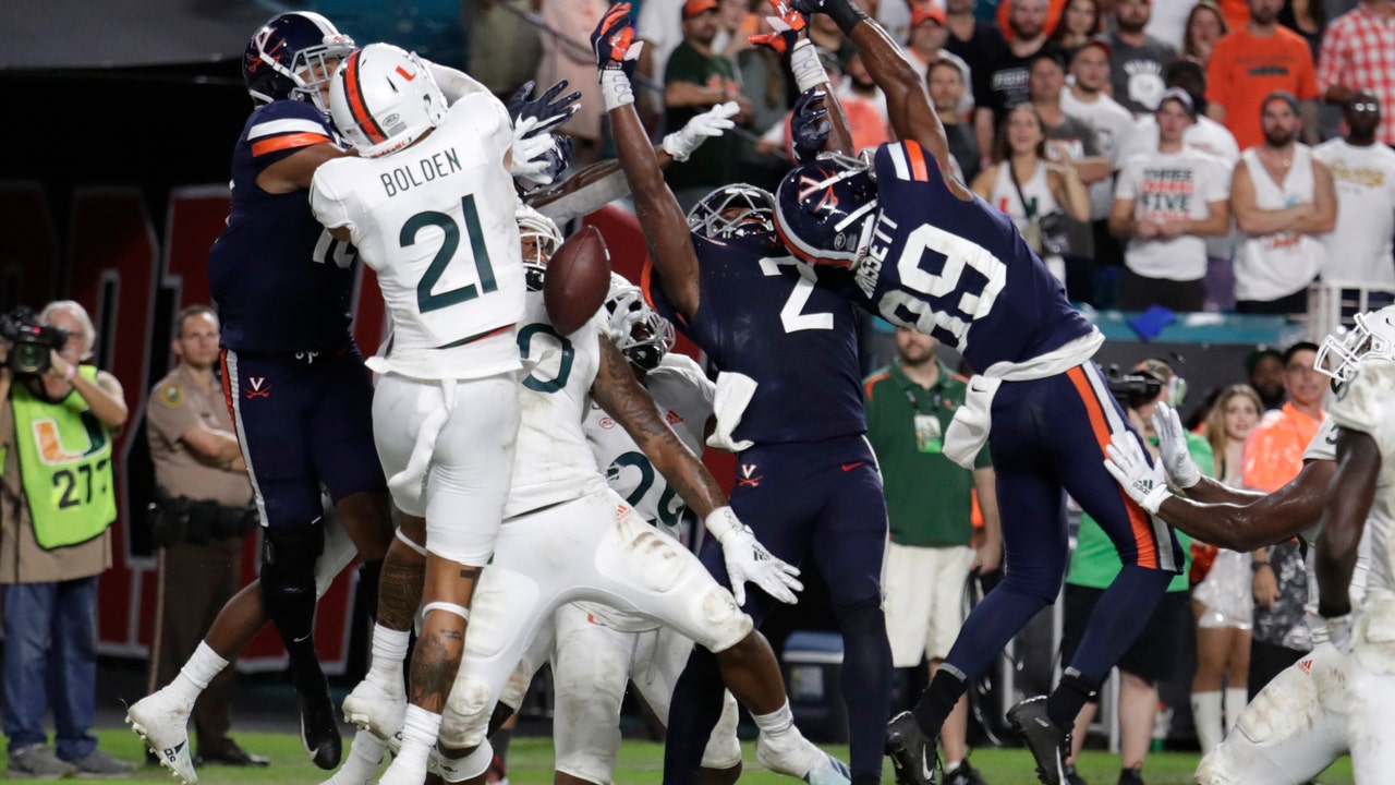 Louisville faces another top defense against Virginia
